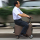 Illustration for article titled This Chinese farmer is recycling suitcases into electric scooters